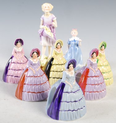 Lot 6 - Six Carlton Ware lady figures; a Royal Doulton...