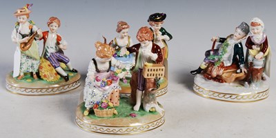 Lot 24 - A group of four Dresden porcelain double...