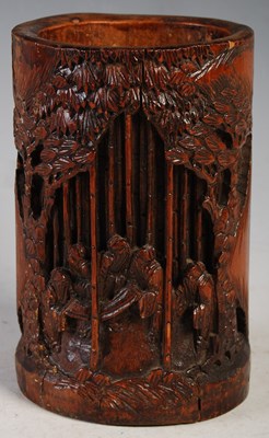 Lot 30 - A Chinese bamboo brush pot carved with figures...