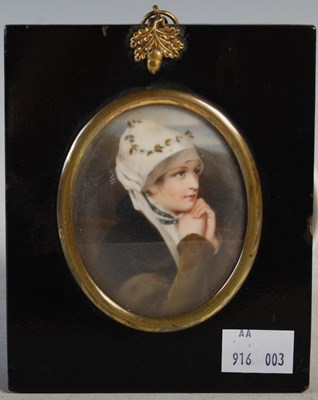 Lot 78 - A late 19th century painted porcelain oval...