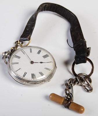 Lot 61 - A vintage white metal open-faced pocket watch,...