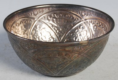 Lot 92 - An Indian white metal bowl chased with birds...