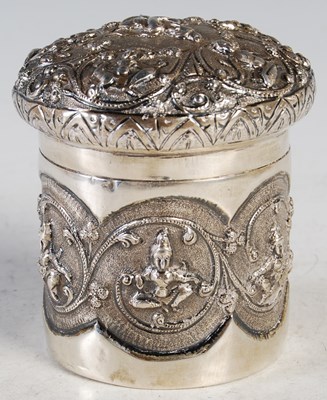 Lot 99 - A Burmese cylindrical jar and cover, repousse...