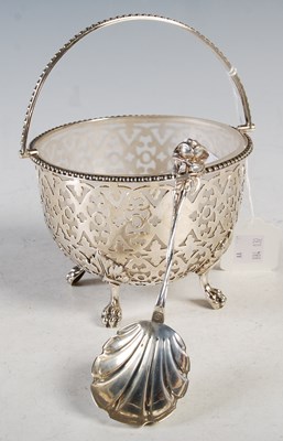 Lot 100 - A Victorian silver sugar basket, pierced sides,...