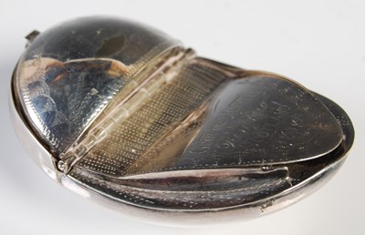 Lot 110 - A Scottish silver-plated curved snuff box with...