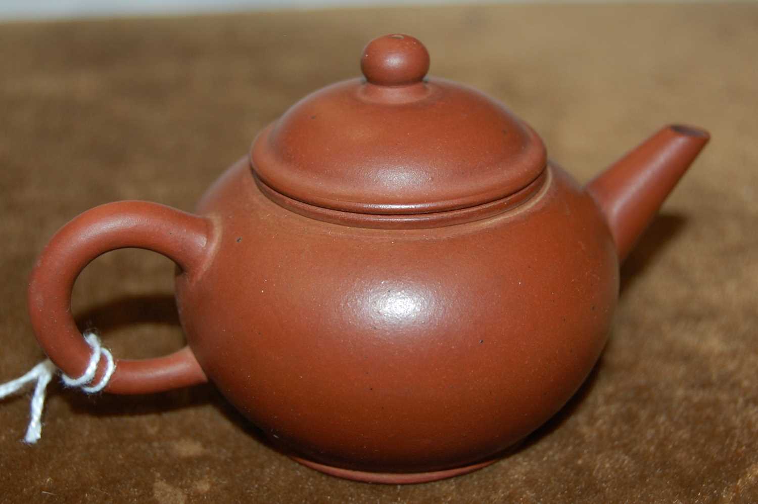 Lot 151 - A Chinese Yixing teapot and cover, impressed...