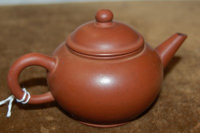 Lot 151B - A Chinese Yixing teapot and cover, impressed...