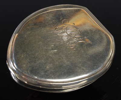Lot 123 - A silver mounted shell snuff box, the hinged...