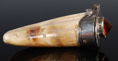 Lot 129 - A 19th century white metal mounted boar tusk...