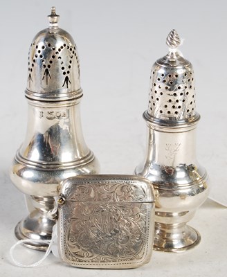 Lot 130 - A collection of silver to include two silver...