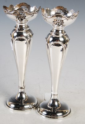 Lot 131 - A pair of Birmingham silver bud vases, 21 cm...