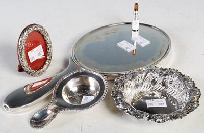 Lot 147 - A collection of silver to include handheld...