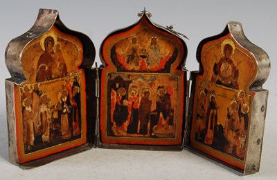 Lot 170 - A polychrome decorated wood and white metal...