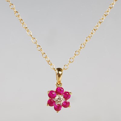 Lot 182 - An 18ct gold necklace suspending 18ct gold...