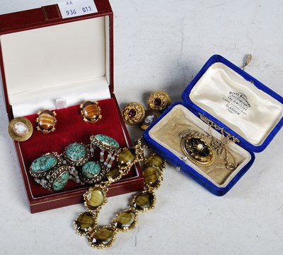 Lot 323 - A box of assorted costume jewellery to include...