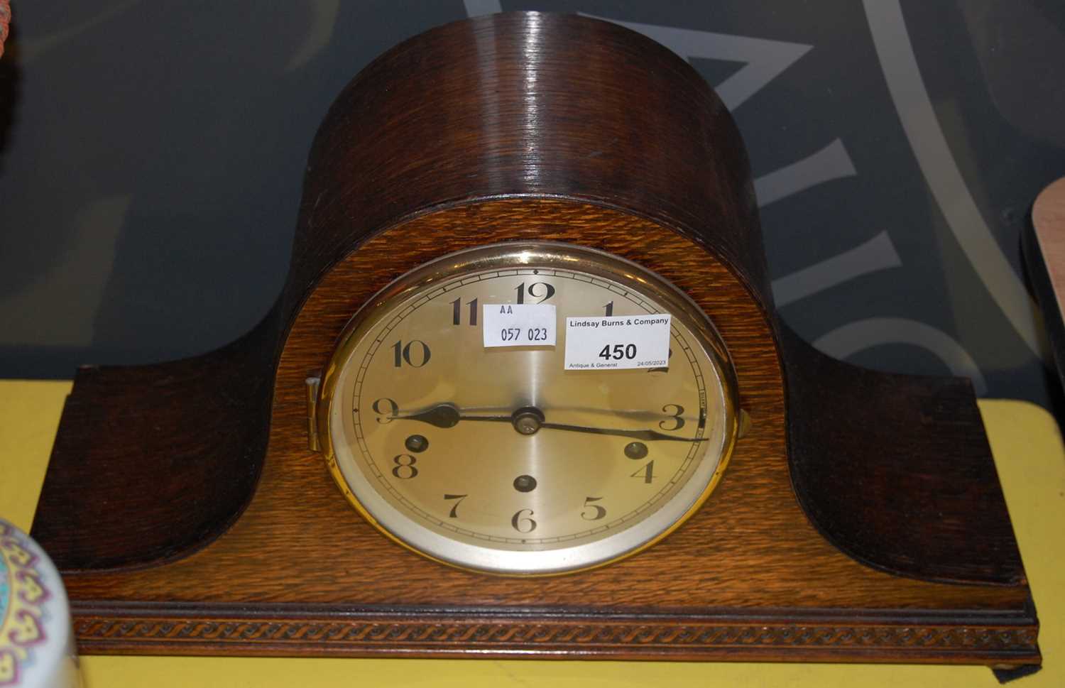 Lot 450 - An early 20th century oak cased mantle clock