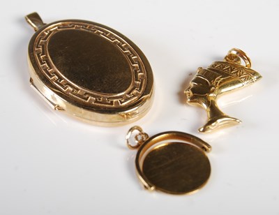 Lot 223 - A 9ct gold oval-shaped locket, 4.3 grams; a...