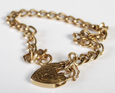 Lot 227 - A yellow metal bracelet with 9ct heart-shaped...