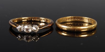 Lot 230 - An 18ct gold wedding ring, size N, 1.7 grams,...