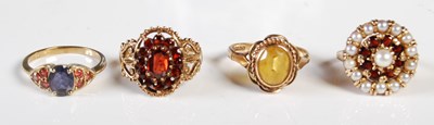 Lot 228 - Four assorted gem set 9ct gold dress rings,...