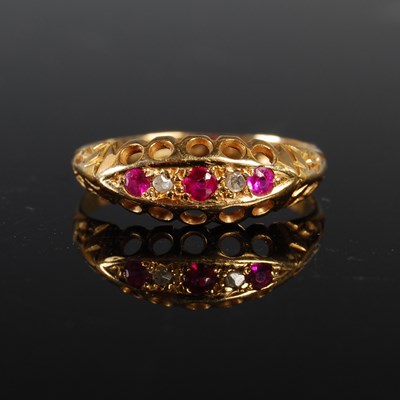 Lot 232 - An 18ct gold garnet and diamond chip five...