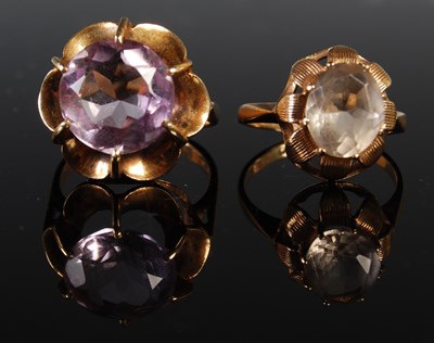 Lot 202 - A 9ct gold and pale amethyst dress ring, size...