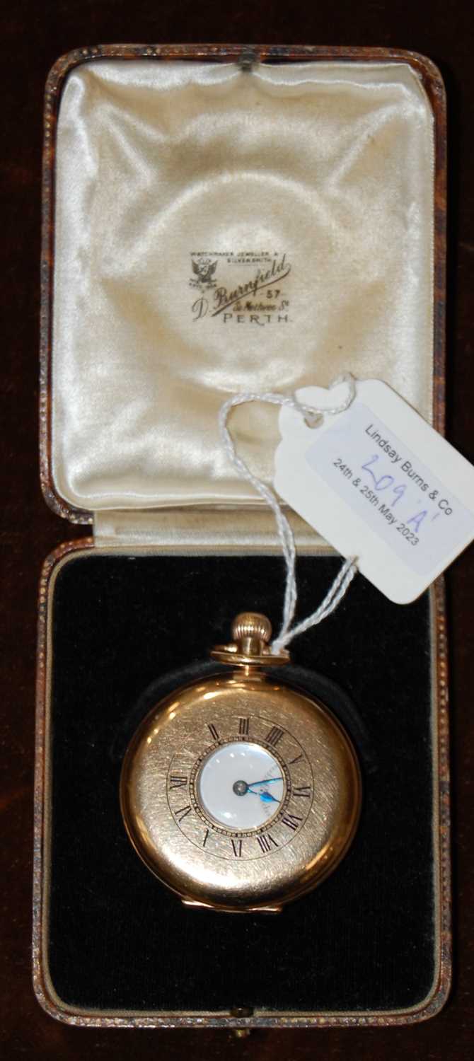 Lot 209 - A 9ct gold half-hunter pocket watch, the black...