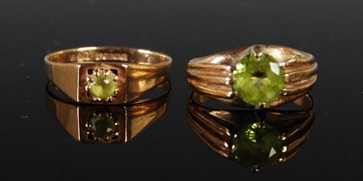 Lot 200 - Two 9ct gold and green gemstone single stone...