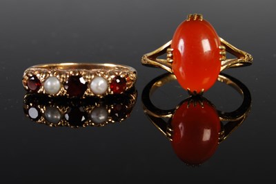 Lot 197 - Two rings to include a yellow metal oval...