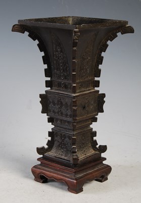 Lot 264 - A Chinese bronze square beaker vase in the...