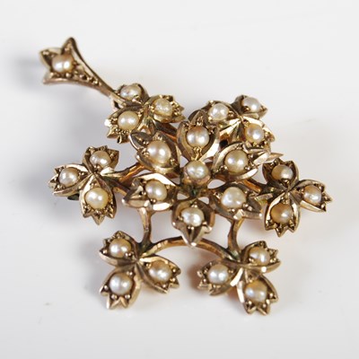 Lot 298 - A yellow metal and split pearl flower-shaped...