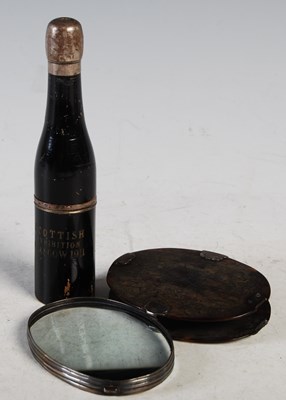 Lot 317 - A novelty pipe in the form of a bottle,...