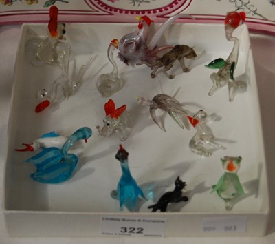 Lot 322 - A small collection of clear and coloured glass...