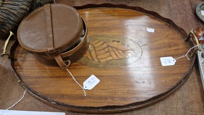 Lot 499 - A mahogany and marquetry inlaid oval tray, 57...