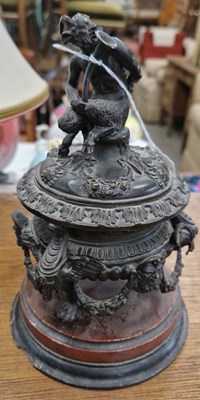 Lot 504 - A late 19th century bronze inkwell and cover,...