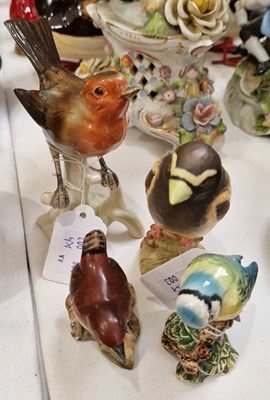 Lot 382 - Three Beswick bird ornaments to include...