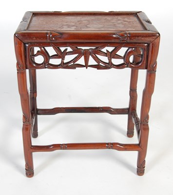 Lot 90 - A Chinese dark wood occasional table, late...