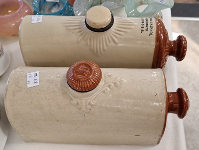 Lot 427 - Two stoneware hot water bottles, one with...