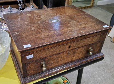 Lot 438 - Oak cased canteen containing assorted cutlery...