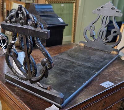 Lot 441 - A carved wooden book stand of maritime...