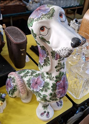 Lot 433 - An Italian pottery model of a dog decorated...