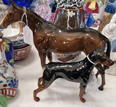 Lot 418 - Royal Doulton model of a brown glazed horse,...