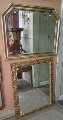 Lot 697 - A gilt framed rectangular bevelled wall mirror...