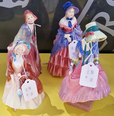 Lot 548 - Four Royal Doulton figures to include...