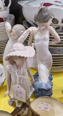 Lot 543 - Three assorted Nao porcelain figures.