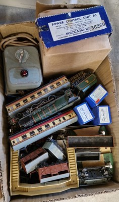 Lot 573 - A box of assorted Hornby Dublo trains, wagons,...