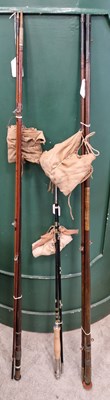 Lot 619 - Three assorted fishing rods.