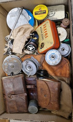 Lot 626 - A box containing assorted fishing tackle,...