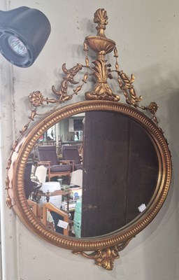 Lot 705 - A gilt framed Neoclassical style oval wall...