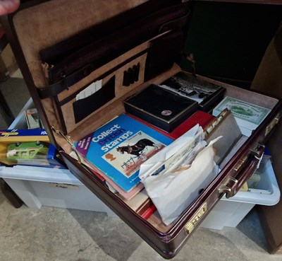 Lot 631 - A vintage burgundy colour briefcase containing...